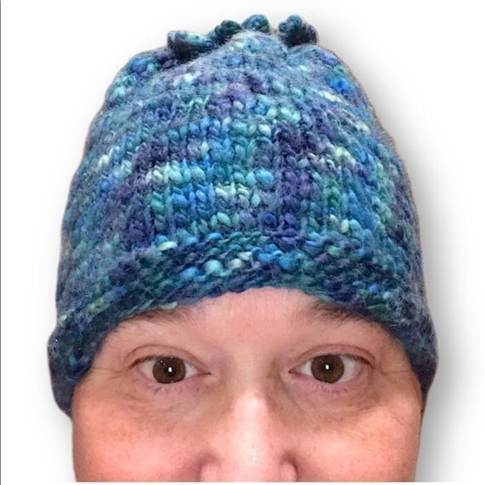 Handmade knit hat with curly Pom Pom